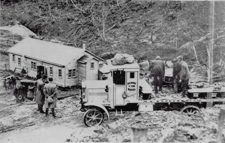 Tunnel Tragedy - Coffins being loaded onto lorry at Arapeti, 1922