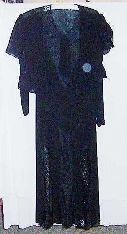 Black chiffon and lace evening dress with bolero.