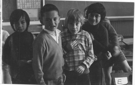 Group of boys in classroom at lunchtime