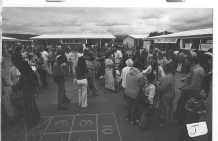 Crowd of people in playground during the school's Gala Day