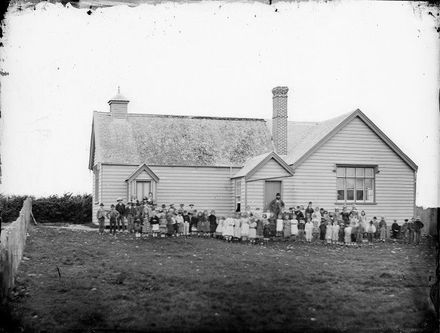 Foxton schoolhouse, pupils and teachers, ca 1870s