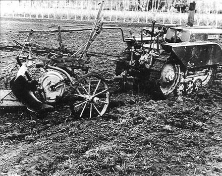 Oliver plough, attached to Bristol-20 tracked tractor