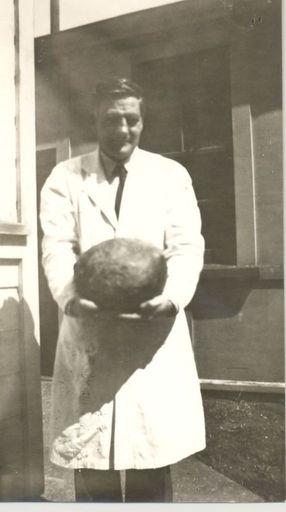 Man holding "Tectonic boulder"