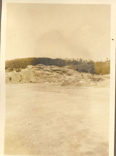 Shot across water to a rock. - Resource cover image