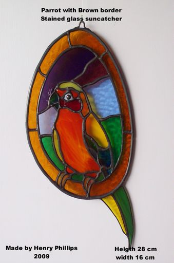 Parrot suncatcher with brown border