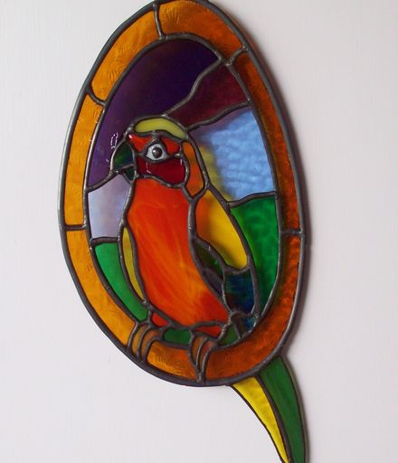 Parrot suncatcher with brown border