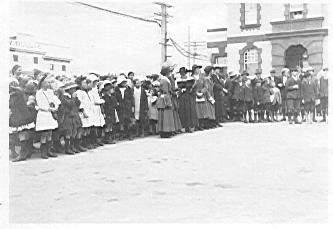 Crowd listening to News of Peace