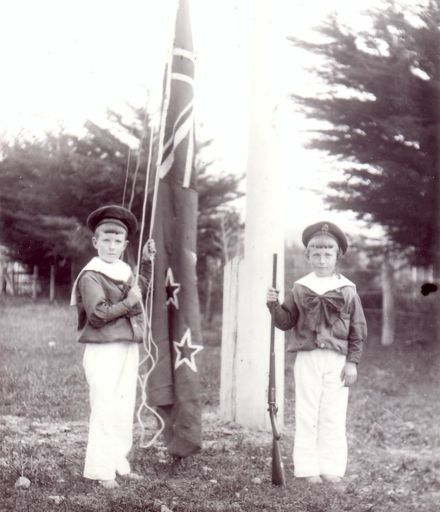 Jack and Rewi Moynihan unfurling the flag, Shannon School, 1901