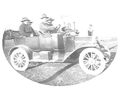 Ken Mitchell and others in car, c.1920's