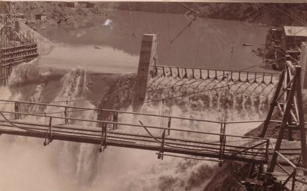Floodwater pouring over top of nearly completed dam, Mangahao, 1 November 1924 - Resource cover image