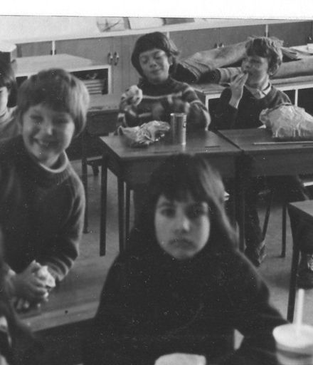 Children having lunch in classroom