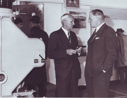 2 men outside Consumers Supply, Electricity Exhibition 1972