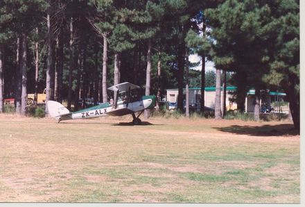 Bi plane ZKALX beside runway at Foxpine Airfield.