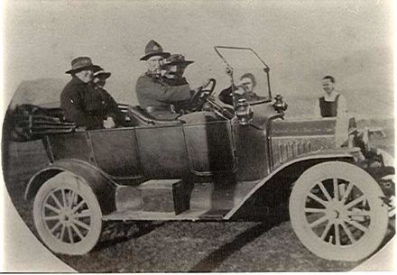 Ken Mitchell and others in car, c.1920's