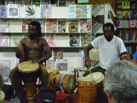 African Drummers Yaw Boateng and Francois Byamana by magazines in Levin Library