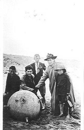 Unidentified group with washed up mine