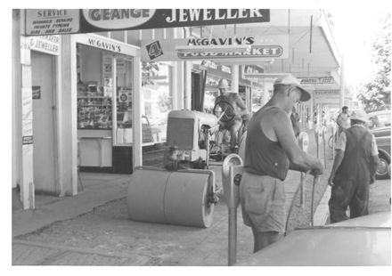 Relaying Footpath, Oxford St., 1970