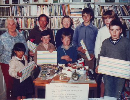 Decorated stones prizewinners with prizes at Shannon Library, 1980's