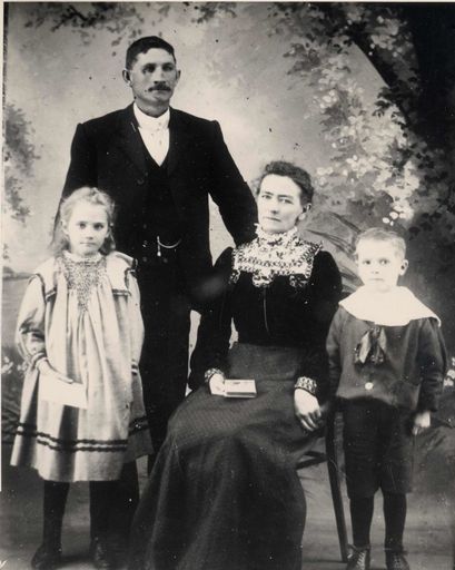 Family of 4 (unidentified) in studio
