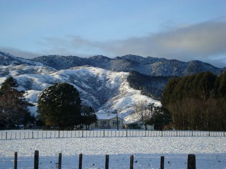 Waking up to snow on old house - Resource cover image