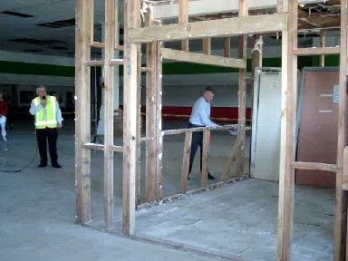 Mayor Duffy takes a sledge hammer to the old Countdown building