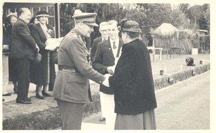 Governer General Sir Bernard Freyberg shaking hands with Mrs Lett - Resource cover image