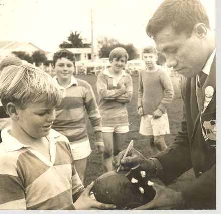 Kei' longi (Tongan winger) signs rugby ball - Resource cover image