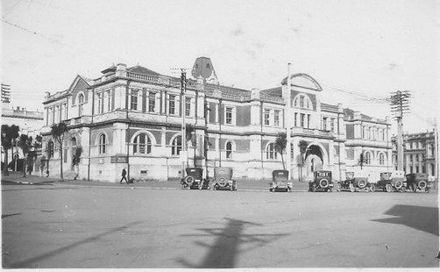 Unidentified large 2-storey public building viewed from back, 1927 or 1928