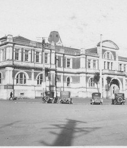 Unidentified large 2-storey public building viewed from back, 1927 or 1928