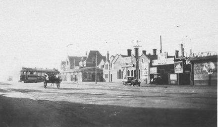 Christchurch railway station viewed from other end of street, 1927 or 1928