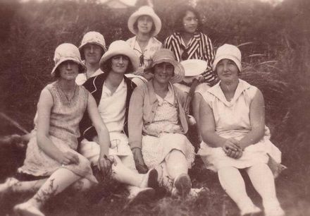 Group of seven women at Foxton Beach, c.1930
