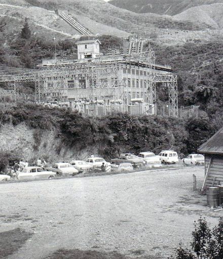 Mangaore Powerhouse with vehicles on roadside downstream, c.1973