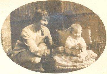 Mother with a child sitting on a chair. - Resource cover image