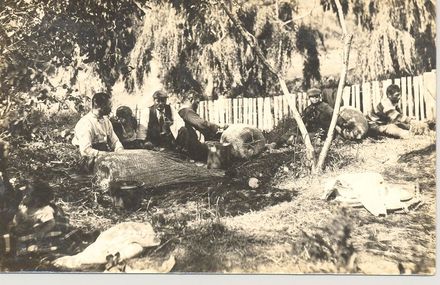 Making eel baskets, c.1900