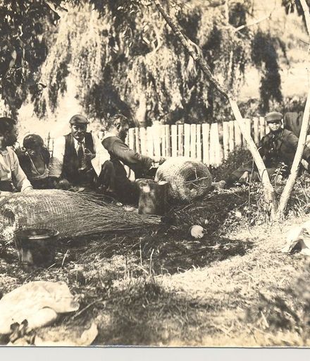 Making eel baskets, c.1900
