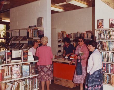 Interior of Shannon Library showing borrowers at issues desk, 1981