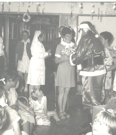 Santa Claus handing out presents at Kimberley