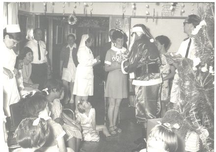 Santa Claus handing out presents at Kimberley