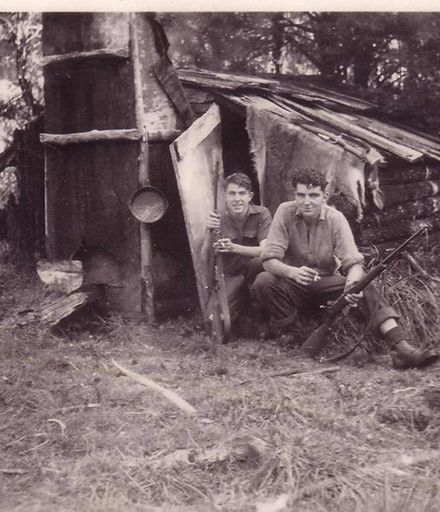 Jim & Fred Kilmister hunting in Tokomaru Valley at J. Burton's hut, 1940s or 50s
