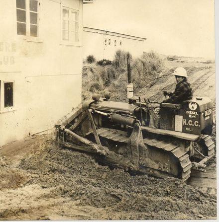 Bulldozing new driveway, Surf Lifesaving Club, 1969