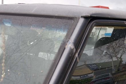 Van outside Mitre 10 - Close up damage