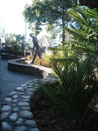 Market gardener with planting.