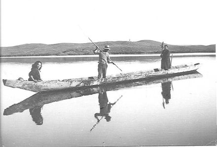 Taueki family in 'Hamaria' canoe, Lake Horowhenua, 1926