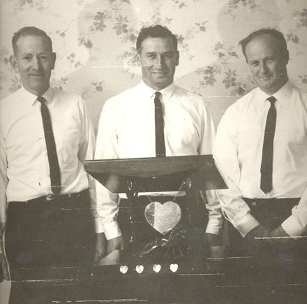 Shannon Lions Club members with ornate lecturn