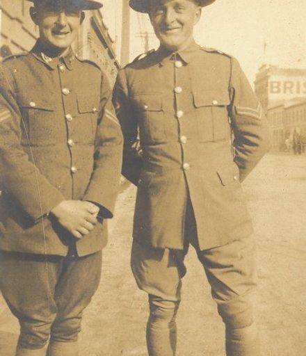 Two young soldiers in uniform.