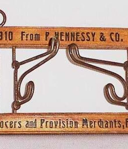 P. Hennessy & Co coat hanger