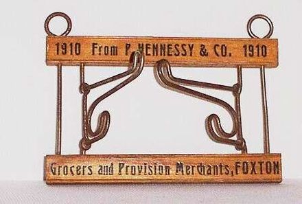 P. Hennessy & Co coat hanger