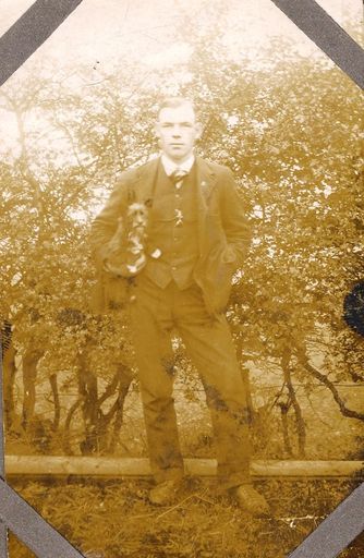 Young man standing in front of vines. c1914-18? - Resource cover image