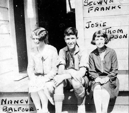 Nancy Balfour, Selwyn Franks and Josie Thompson sitting on porch, late 1920's
