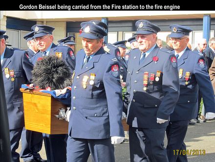Gordon Beissel being carried from the fire station to the fire engine - Resource cover image